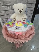 Bukiet z pampersów,  maskotki, grzechotek,  skarpetek. 