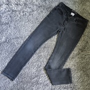 Czarne spodnie jeansowe Next r. 140
