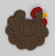 wiosenna kura - podkładka pod kubek na szydełku