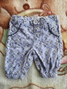 Sztruksowe fioletowe spodnie w kwiatki Name It 56 - 62 jak nowe