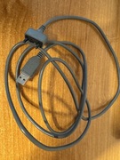 Słuchawki i kabel USB do starego Sony Ericssona.