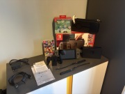 Konsola Nintendo Switch + Mario Kart 8 Deluxe + Wired Fight Pad Pro