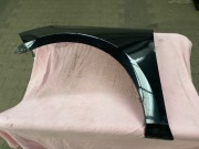 Blotnik przedni lewy Fiesta MK8 czarny w kolor 