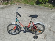 Rower dziecięcy z bocznymi kołkami