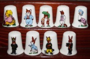 Naparstki Kolekcjonerskie Porcelanowe zestaw 9 sztuk postaci z bajki 
