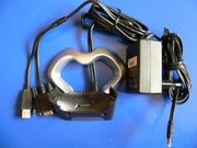 Stacja dokująca z zasilaczem do palmtopa HP.