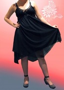 Śliczna, czarna sukienka z cekinami.