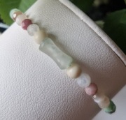 Bransoletka damska z kamieni naturalnych,pastelowa,regulowana,nić jedwabna 