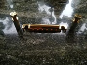 Zaczep strun Gotoh Gold