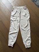 spodnie Sinsay beżowe s nowe nude joggery na co dzień praca biuro wiskoza