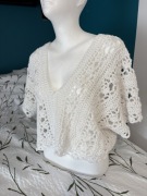 Modna koronkowa bluzka top na szydełku crop top biała koronka lato plaża 