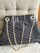 Skórzana pikowana torebka Gino Rossi na łańcuchu 