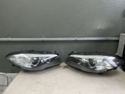 Bmw f10 f11 M5 lampy bi xenon reflektory kompletne Hella
