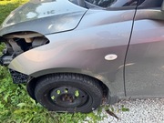 BŁOTNIK LEWY PRZÓD SUZUKI SWIFT MK7 ZCD