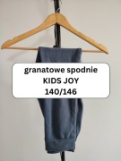 Bawełniane spodnie chłopięce Kids Joy 140/146 granatowe