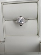 Pierścionek z naturalnym brylantem 1 ct D VS1 GIA i 0.54ct dia. bocznych