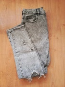 Mom jeans z dziurami American Eagle