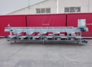 Ręczny stół do obierania czosnku na 10 stanowisk.