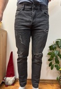 Spodnie jeansowe czarne jeansy z dziurami rozdarciami HM Denim W34 L