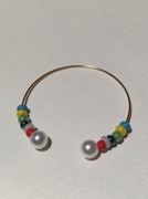 Bransoletka nowa, regulowana,szklane koraliki,imitacja perły 1, 5x1,5 cm..