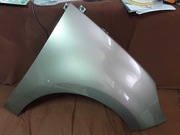 Błotnik Scenic III prawy przed liftem