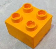 LEGO Duplo klocek 2x2 jasnopomarańczowy 