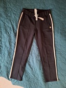 Czarne spodnie z białymi lampasami Styl elegancki sportowy r. L (40)