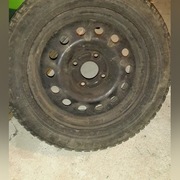 Felgi stalowe 15 calowe plus opony zimowe Dunlop 