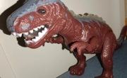 Zabawka dinozaur świecący i głosem