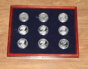 9 monet Dolar LIBERTY + kasetka