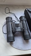 Kompaktowa składa lornetka Tronic 10x25 z małym defektem.