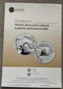 Folder - Ogłoszenie do srebrnej monety 10 zł 30 lecie pierwszych wyborów 