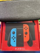 Nintendo Switch Oled 64GB + karton + gratis etui na konsolę i gry