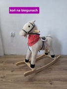 Zabawka interaktywna koń na biegunach. 