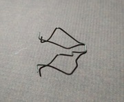 Sprężyna mocująca żarówkę H7 alfa romeo 147 lift, peugeot 207, scenic itp.