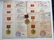 Osiem dokumentów i medali „100-lecie Lenina za pracę” 