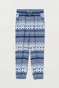 Joggersy jasnoniebieskie wzór H&M Rozm. 116 cm