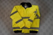 Żółta odblaskowa kurtka XL  ocieplana z kapturem chowanym w kołnierzu