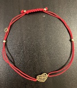 Bransoletka srebrna pozłacana na czerwonym sznurku ażurowe serce YES