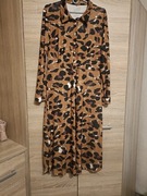 Midi sukienka zapinana po całości na guziki z długim rękawem 