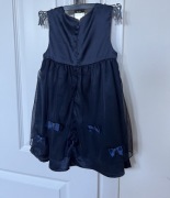 Elegancka sukienka z kokardami i tiulem rozmiar 92