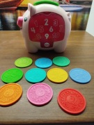 Edukacyjna świnka skarbonka Fischer Price 