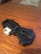 Blokada otwarcia drzwi do pralki Whirlpool Polar.