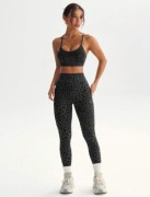 Komplet sportowy: biustonosz i legginsy z nadrukiem w panterkę