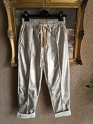 Spodnie damskie srebrne woskowane S z kantem La Strada