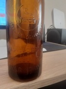 Stara butelka po piwie.WŁASNOŚĆ BROWARU HABERBUSCHiSCHIELE S.A.WARSZAWA