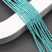 Turkus kulka gładka 2,3 mm., sznurek 19 cm.