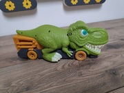 Dinozaur zjadający samochodziki 