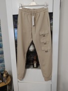 Spodnie dresowe w kolorze beżowym , ozdobne kieszonki , MEGI C167