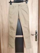 66. Beżowe spodnie damskie rurki biodrówki rozmiar XS